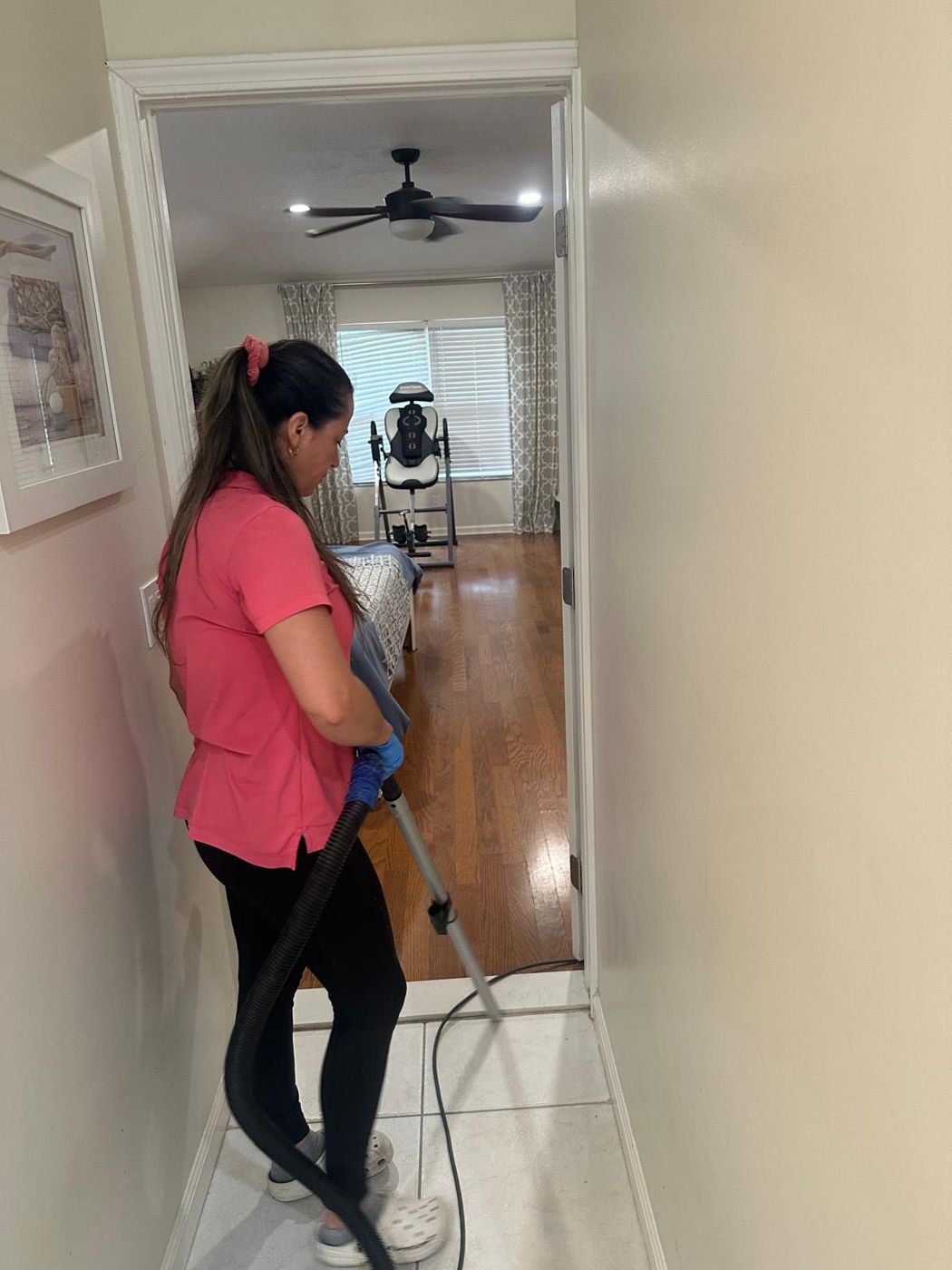 Vacuuming a hallway